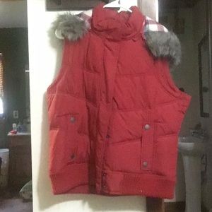 Red and flannel fur lined hooded puffy vest.
